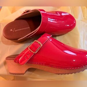 Anthropologie Glossy Red Clogs with Gold Buckle